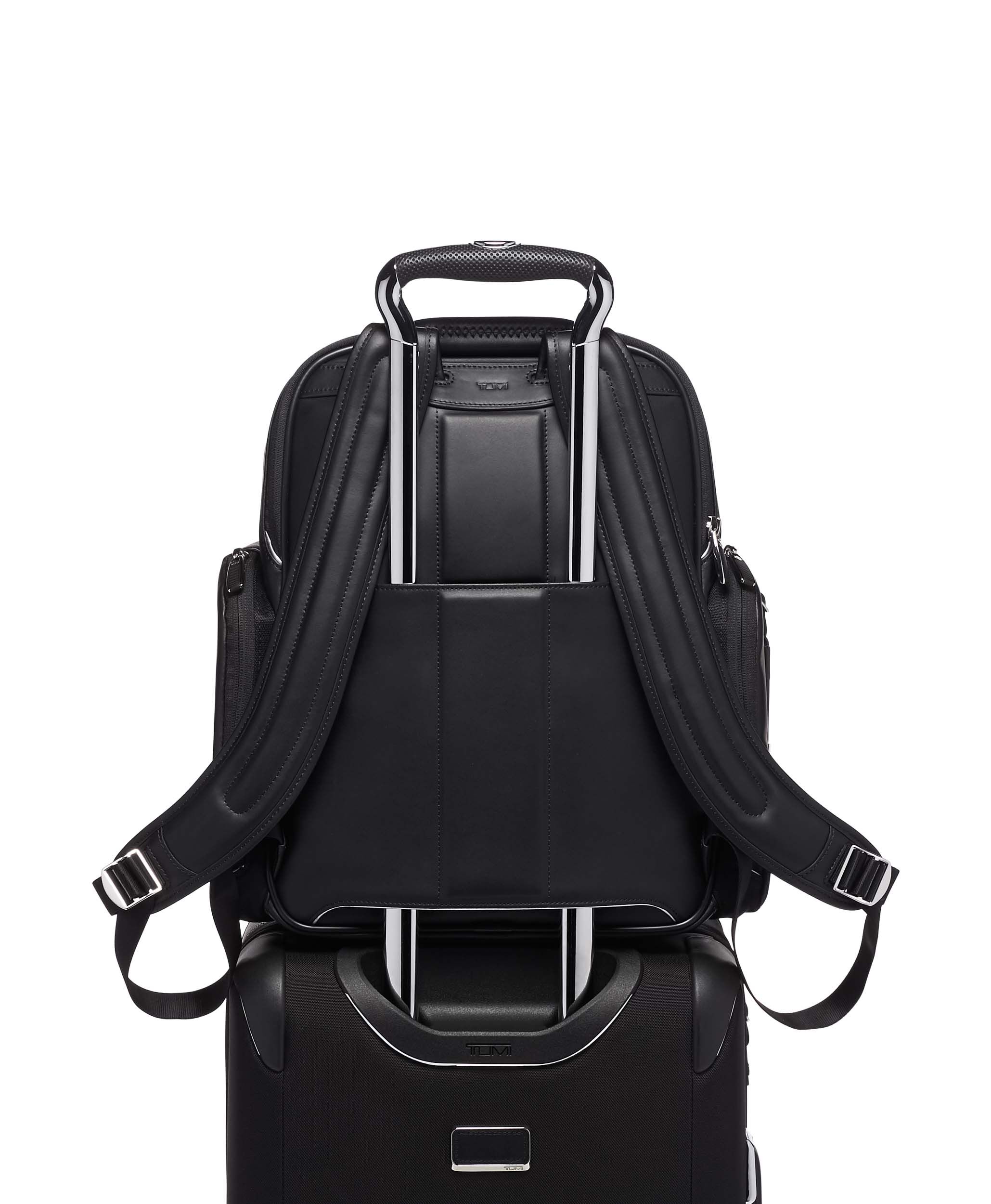 leather backpack with luggage strap