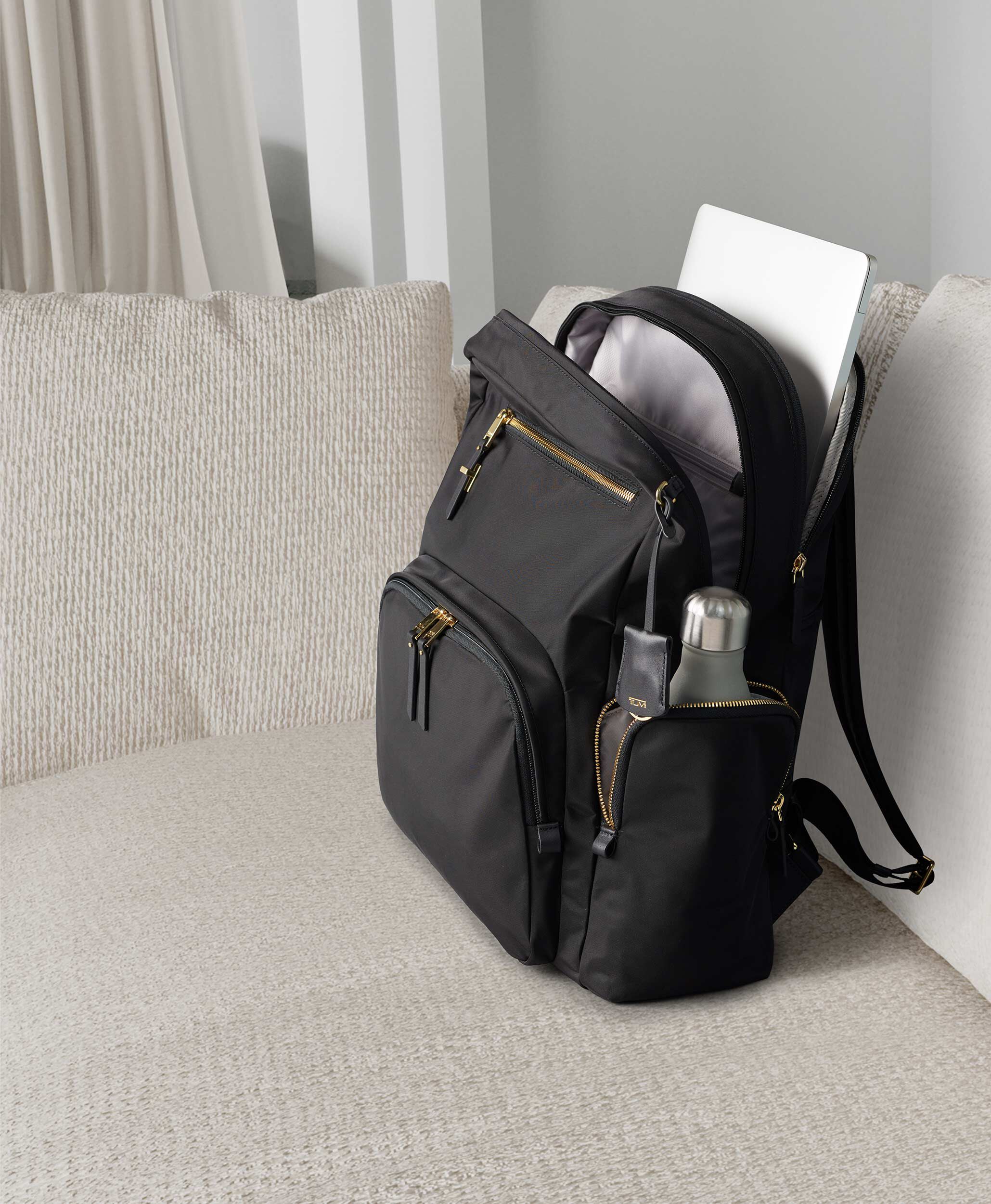 tumi back bag
