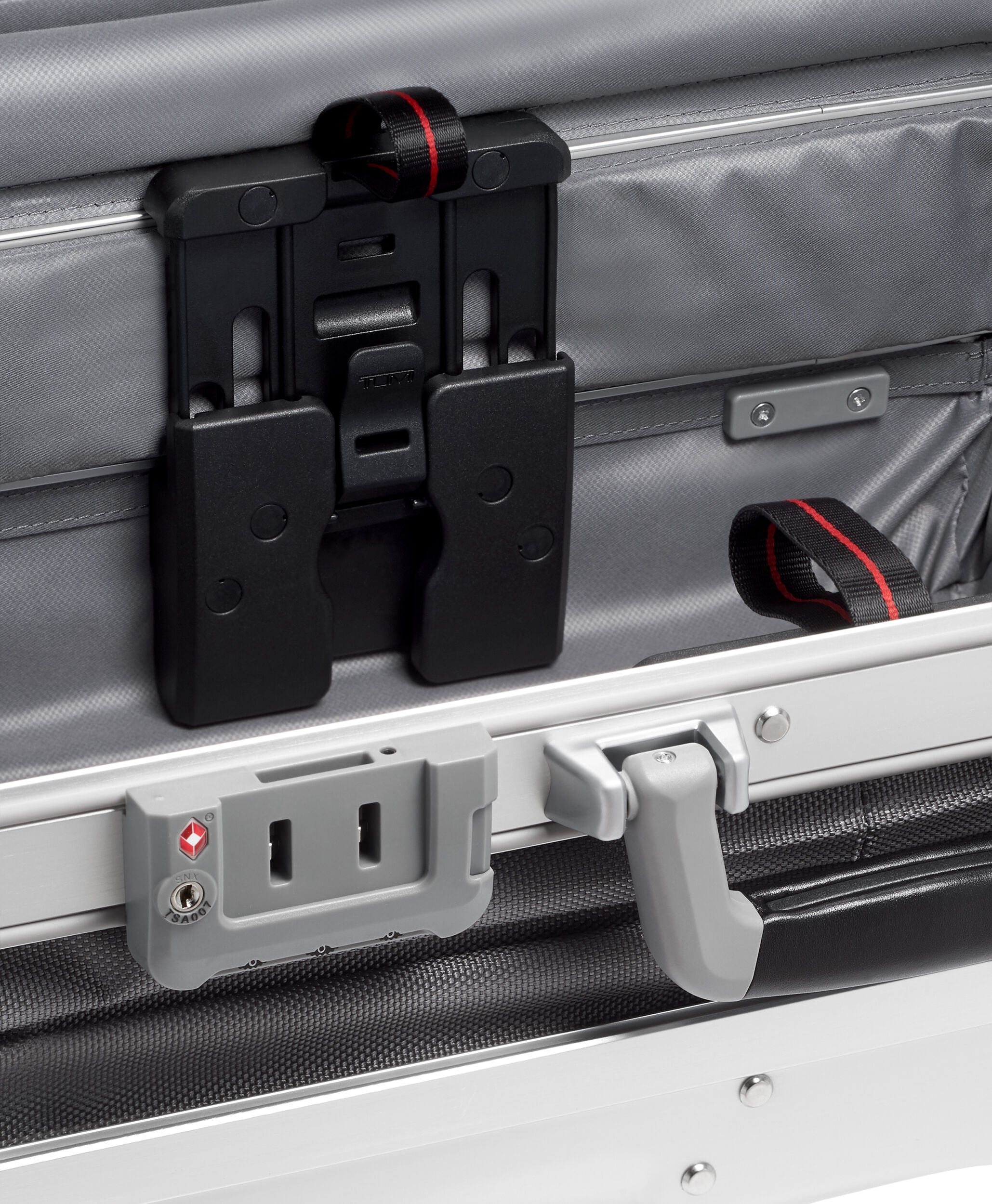Tumi hot sale silver suitcase