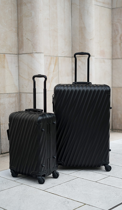 Black aluminum luggage sale